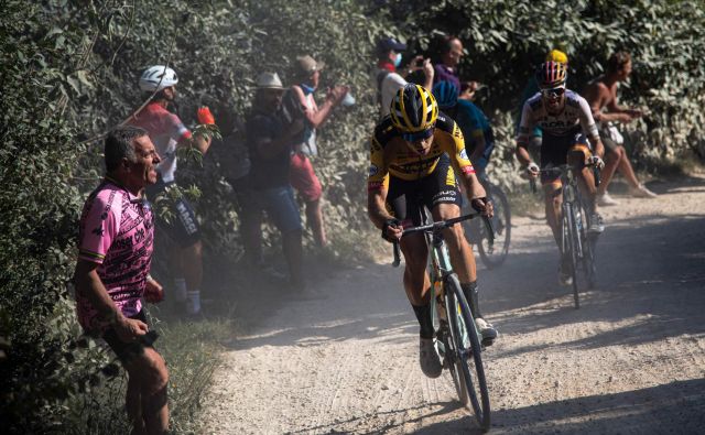 Wout van Aert se je najbolje znašel na razbeljenem toskanskem makadamu. FOTO: AFP