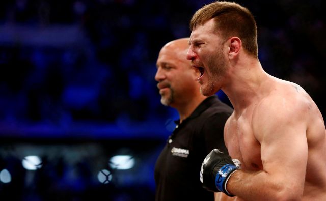 Stipe Miočić je ubranil šampionski pas združenja UFC v težki kategoriji. FOTO: Rodolfo Buhrer/Reuters