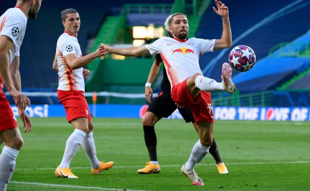 Kevin Kampl je bil med najboljšimi na igrišču ob četrtfinalni tekmi Leipziga z Atleticom. FOTO: Lluis Gene/AFP