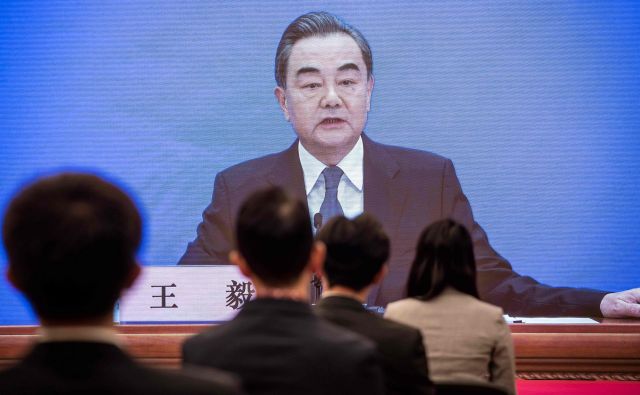 Kitajski zunanji minister Wang Yi si je za prvo pot v tujino po izbruhu pandemije izbral Evropo. FOTO: Nicolas Asfouri/Afp