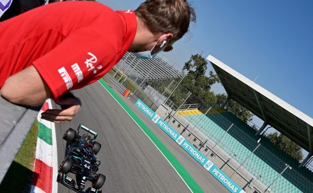 Kje bo kariero nadaljeval Sebastian Vettel? FOTO: Miguel Medina/AFP