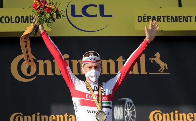 Tadeju Pogačarju se finančno pozna uspešno kolesarjenje na letošnjem Touru. FOTO: Christophe Petit Tesson/Reuters
