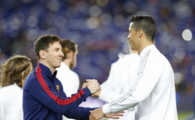 Lionel Messi in Cristiano Ronaldo sta daleč najboljša strelca lige prvakov. FOTO: Albert Gea/Reuters