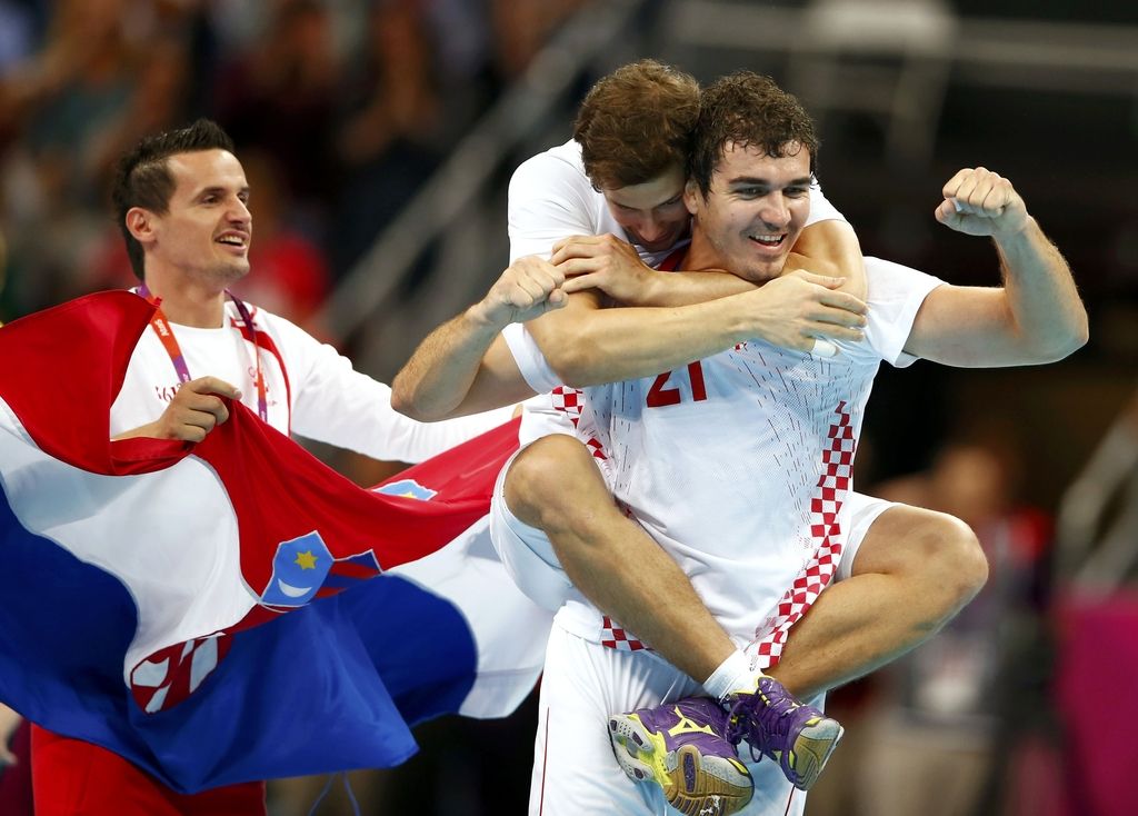 Francoski rokometaši ubranili zlato kolajno iz Pekinga in se zapisali v zgodovino