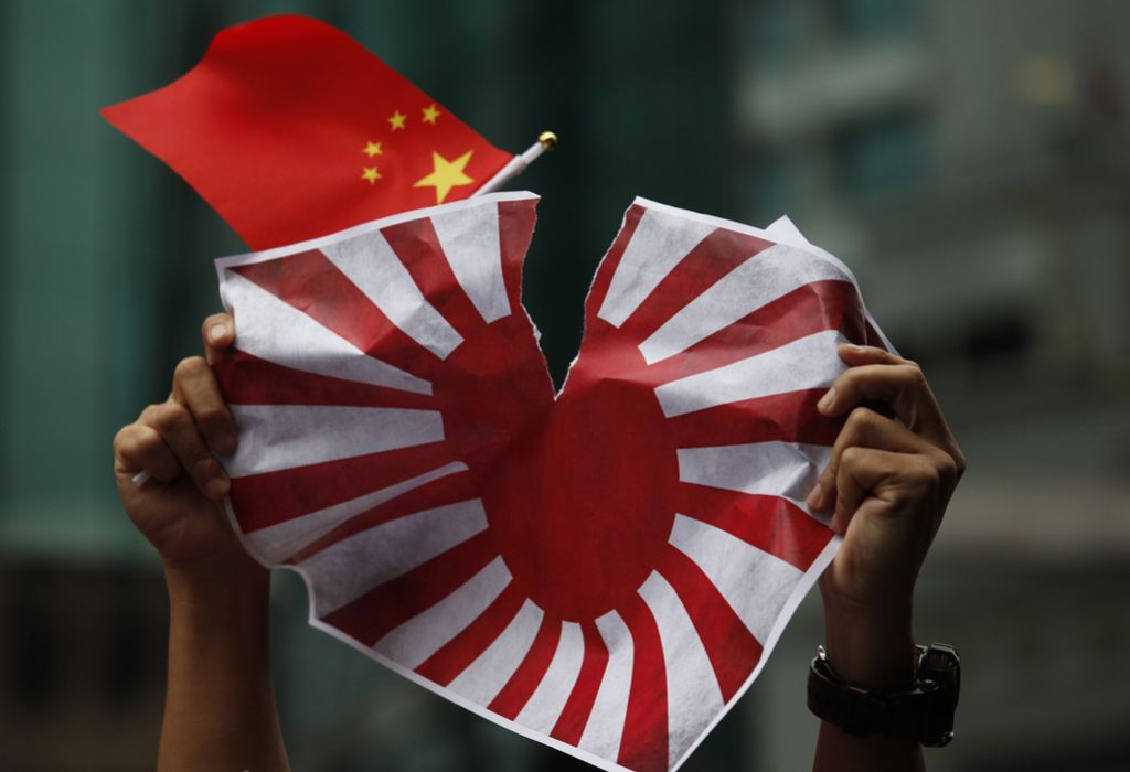Tokio od Pekinga zahteva odškodnino in ponuja roko sprave