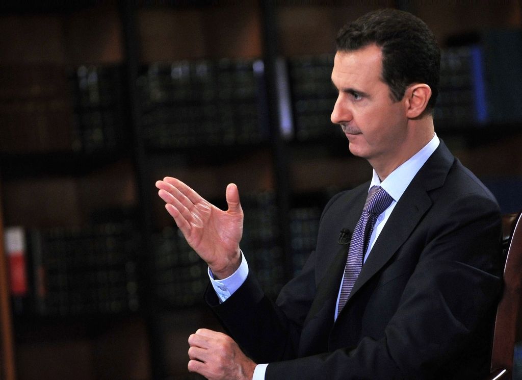 Asad: Sirija bo izpolnila resolucijo o kemičnem orožju