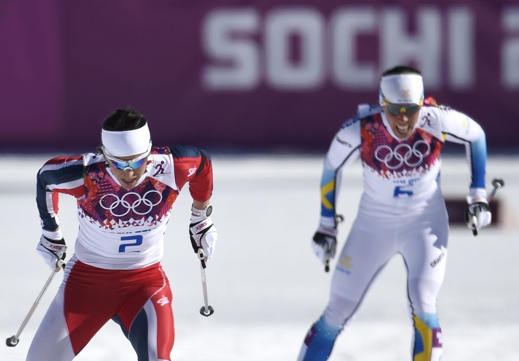 Bjørgnovi po napetem finišu zlato v skiatlonu