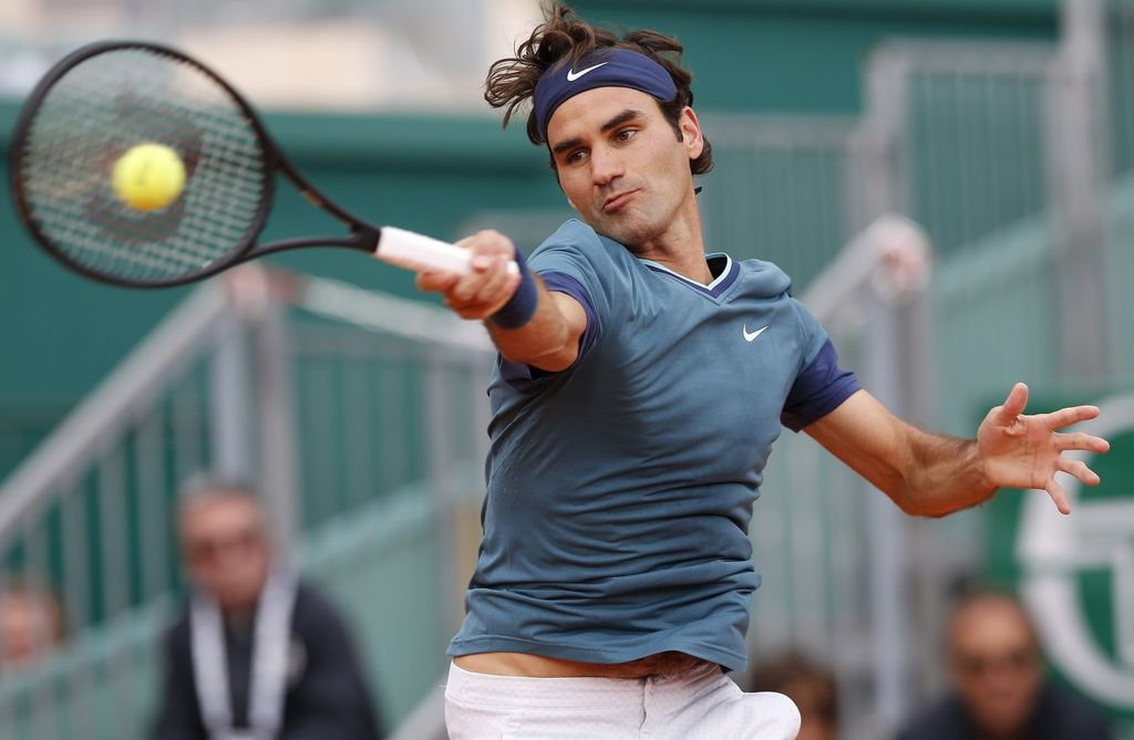 Federer oddal le tri igre, Nadal hitro ujel ritem