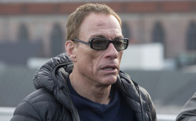 Actor Jean-Claude Van Damme wears sunglasses during a press conference in Munich, 14 December 2017. Van Damme is going to play the lead character in Amazon's new series 'Jean-Claude van Johnson'. Photo: Tobias Hase/dpa