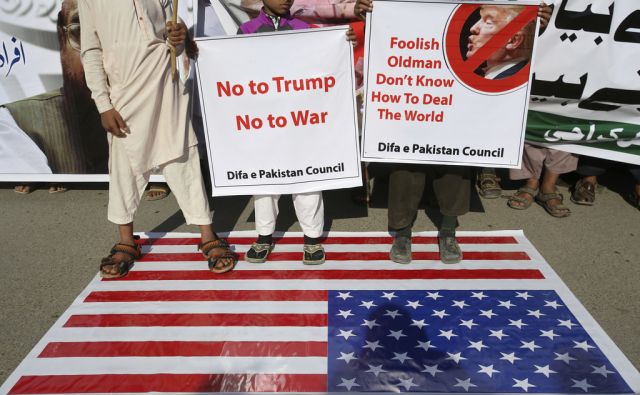 Supporters of Pakistani religious group rally to condemn a tweet by U.S. President Donald Trump in Karachi, Pakistan, Tuesday, Jan. 2, 2018. Trump slammed Pakistan for 'lies & deceit' in a New Year's Day tweet that said Islamabad had played U.S. leaders